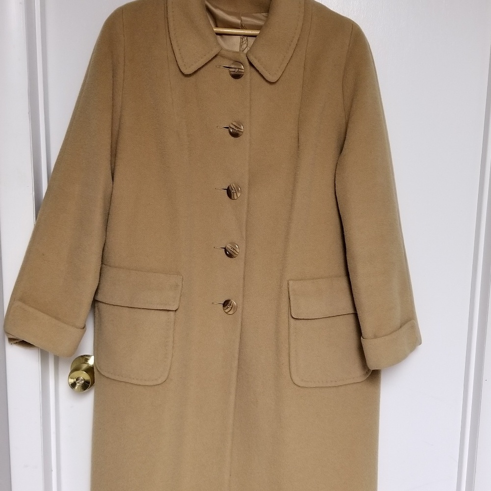 Vintage womans 100% pure wool coat .